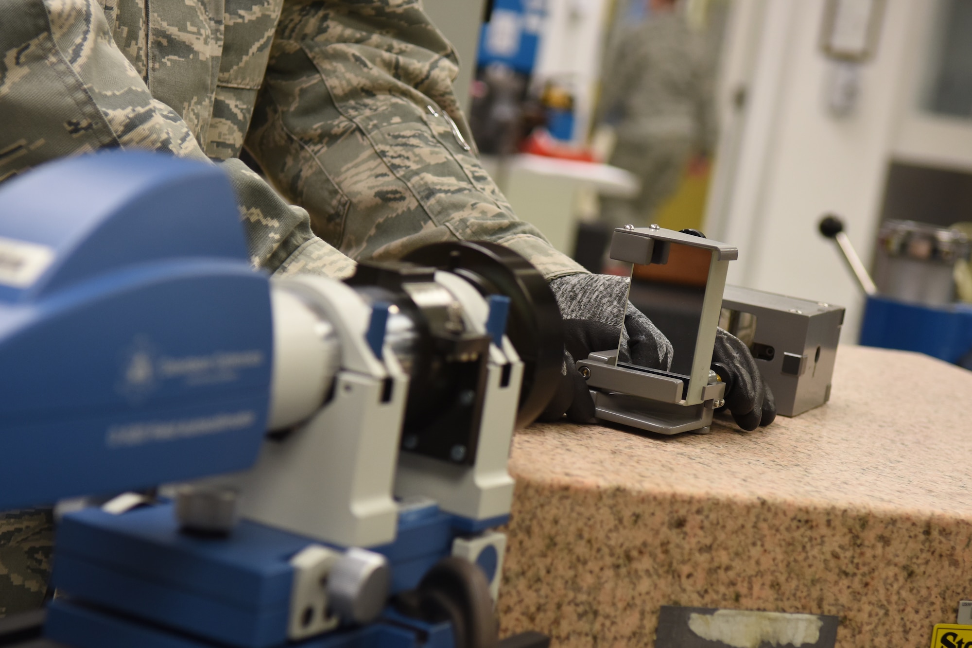 Senior Airman James Laidlaw, 4th Component Maintenance Squadron test, measurement and diagnostic equipment technician, calibrates the angles of an optical prism, Nov. 18, 2015, at Seymour Johnson Air Force Base, North Carolina. The TMDE flight has its own internal quality assurance program that performs end-of-line and over-the-shoulder inspections in the precision measurement equipment lab. (U.S. Air Force photo/Airman Shawna L. Keyes)