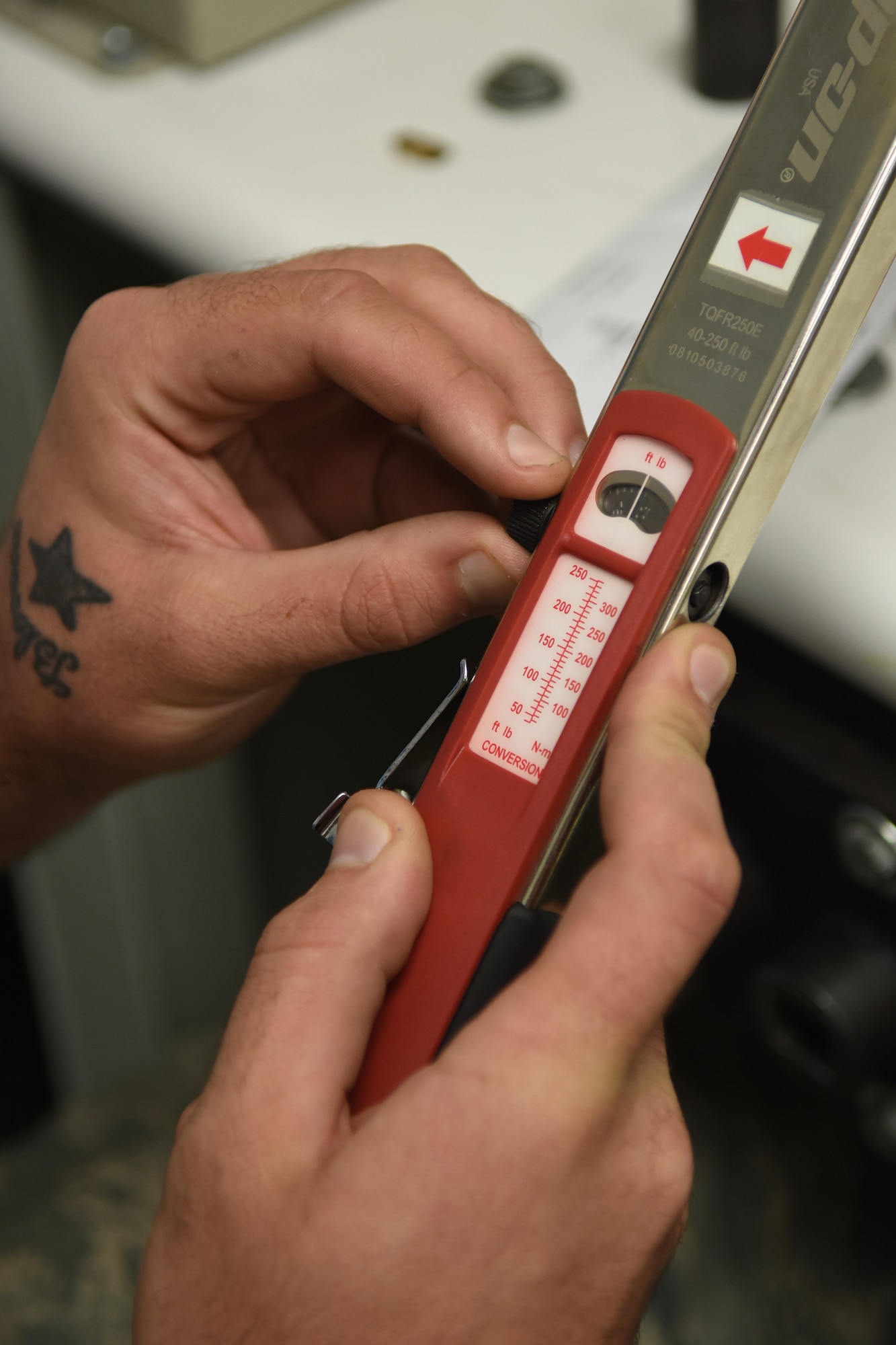 Airman Eric Fischer, 4th Component Maintenance Squadron test, measurement and diagnostic equipment technician, calibrates a torque wrench, Nov. 18, 2015, at Seymour Johnson Air Force Base, North Carolina. The precision measurement equipment lab handles more than 8,500 pieces of equipment from various squadrons and other off-base agencies. (U.S. Air Force photo/Airman Shawna L. Keyes)