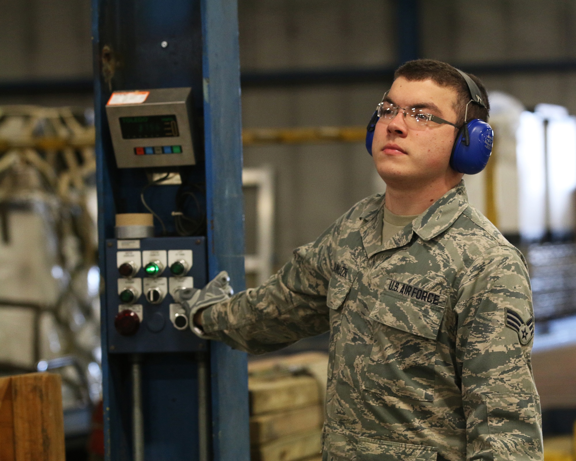 WRIGHT-PATTERSON AIR FORCE BASE, Ohio – Senior Airman Nicholas Giannuzzi, 87th Aerial Port Squadron cargo processor, operates a 463L pallet system, which is used for moving large amounts of cargo during training held on the Nov. 6, 2015 unit training assembly. (U.S. Air Force photo /Tech. Sgt. Patrick O’Reilly)