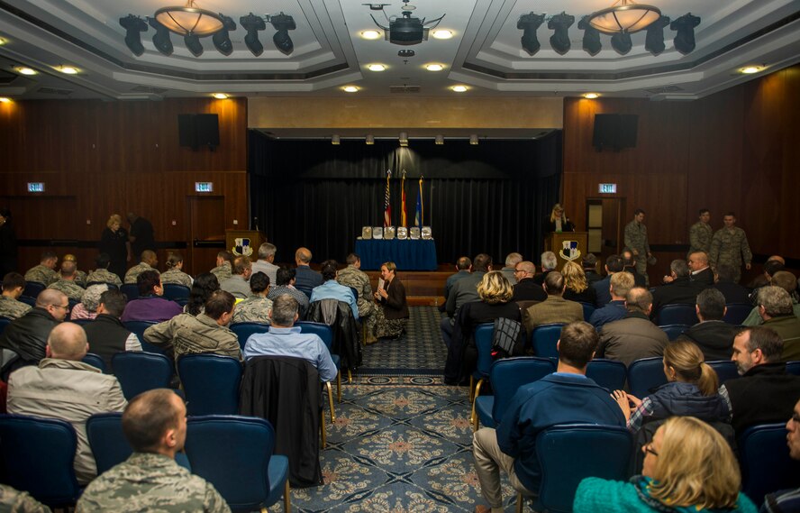 Spangdahlem community members sit before the start of the Civilian Length of Service Recognition ceremony in Club Eifel at Spangdahlem Air Base, Germany, Nov. 20, 2015. Members of the recipients’ squadrons, including the 470th Air Base Squadron, 52nd Civil Engineer Squadron, 52nd Fighter Wing, 52nd Force Support Squadron, 52nd Logistics Readiness Squadron, 52nd Mission Support Group and the Defense Commissary Agency, attended the ceremony to support their recognized member. (U.S. Air Force photo by Airman 1st Class Timothy Kim/Released)