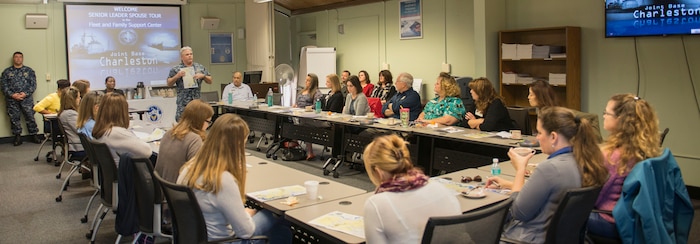 Navy Captain Timothy Sparks, Joint Base Charleston deputy commander, begins the day for the JB Charleston senior leadership spouses with a background brief about the Naval Weapons Station in the Fleet and Family Support Center at JB Charleston – NWS, S.C., on Nov. 20, 2015. The previous day, the spouses had been given a tour of the Air Base to include demonstrations by the canine unit and a static display of one of JB Charleston’s C-17 Globemaster III’s. (U.S. Air Force photo/Airman 1st Class Thomas T. Charlton)