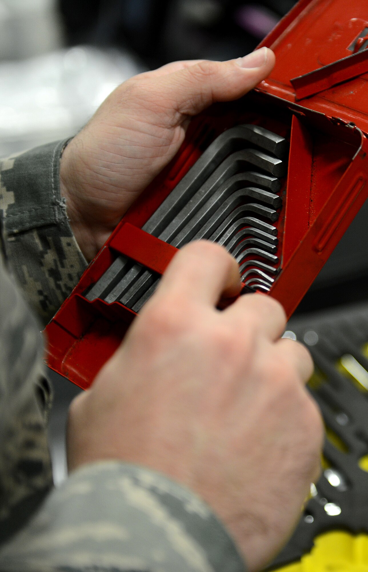 Staff Sgt. Stephen Burns, 62nd Aircraft Maintenance Squadron electrical and environmental systems craftsman, checks an allen key set at the Composite Tool Kit area on the McChord Field flight line Nov. 24, 2015, at Joint Base Lewis-McChord, Wash. An allen key is one part of the E&E tool kit and is used on a daily basis to fix aircraft maintenance issues. (U.S. Air Force photo/Senior Airman Divine Cox)
