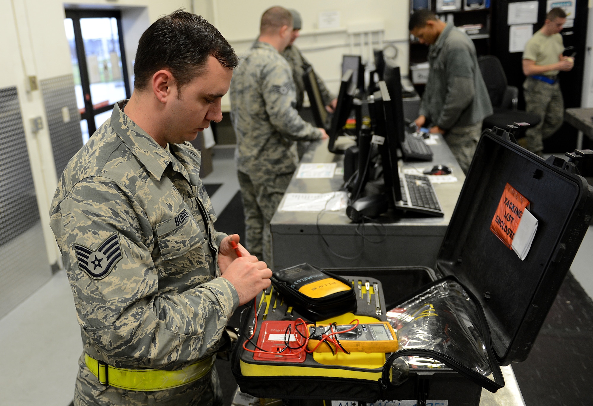 Staff Sgt. Stephen Burns, 62nd Aircraft Maintenance Squadron electrical and environmental systems craftsman, inspects a tool box at the Composite Tool Kit area on the McChord Field flight line Nov. 24, 2015, at Joint Base Lewis-McChord, Wash. Burns and other 62nd AMXS Airmen created a new tool box that included tools used every day by E&E to reduce the trips to and from the Composite Tool Kit area. (U.S. Air Force photo/Senior Airman Divine Cox)