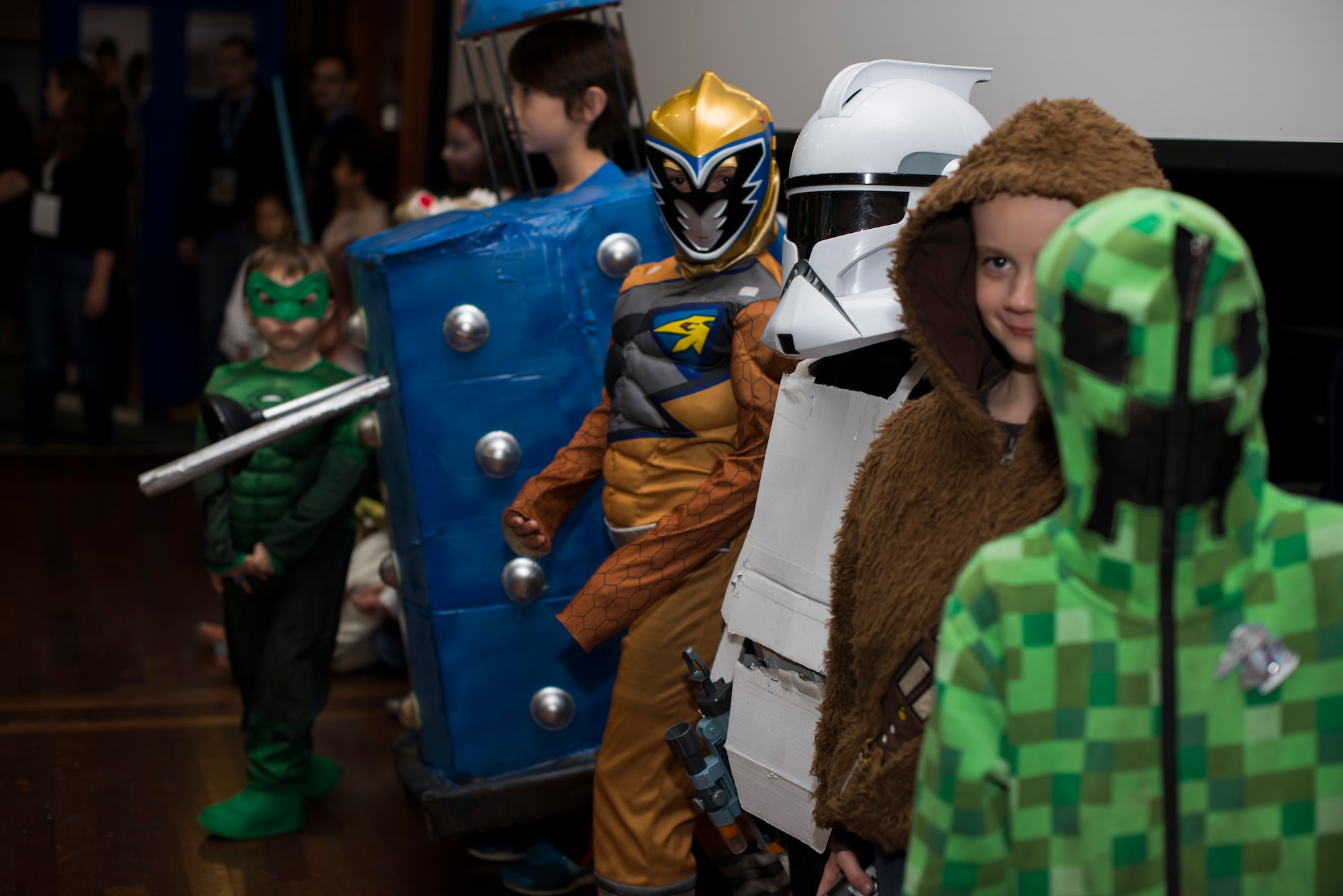 Children participate in a costume contest during Operation Sci-Fi Con at Spangdahlem Air Base, Germany, Nov. 23, 2015. During the event, families dressed as their favorite science fiction characters. (U.S. Air Force photo by Staff Sgt. Christopher Ruano/Released)