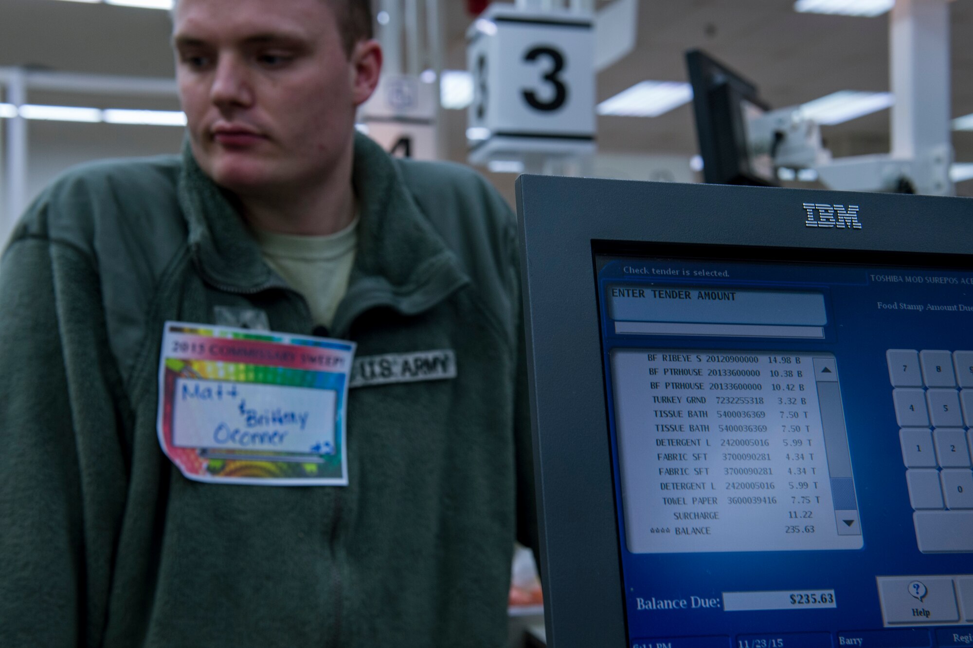 The price of groceries for U.S. Army Sgt. Matthew O'Connor, 52nd Medical Group NCO in charge of the Veterinary Clinic treatment facility, and his wife is displayed on a screen during the 2015 Commissary Sweep at Spangdahlem Air Base, Germany, Nov. 23, 2015. The O'Connor's were one out of five families participating in the event. (U.S. Air Force photo by Senior Airman Rusty Frank/Released)