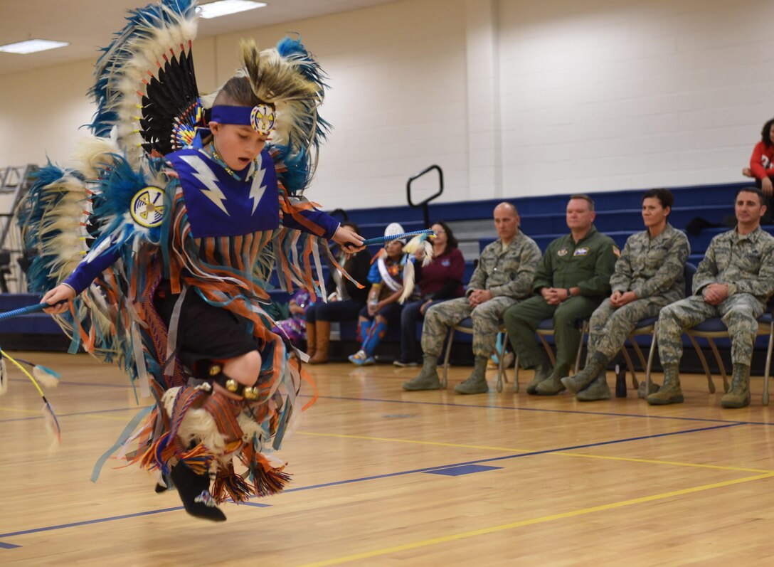 A Native American dancer from the Denver Indian Center Circle of Learning group perform at the Buckley Fitness Center on base Nov. 23, 2015. The Circle of Learning dancers are a group of children from Colorado’s local tribes that performed traditional dances and songs for Team Buckley members to commemorate Native American Heritage month. (U.S. Air Force photo by Airman 1st Class Samantha Meadors/Released)