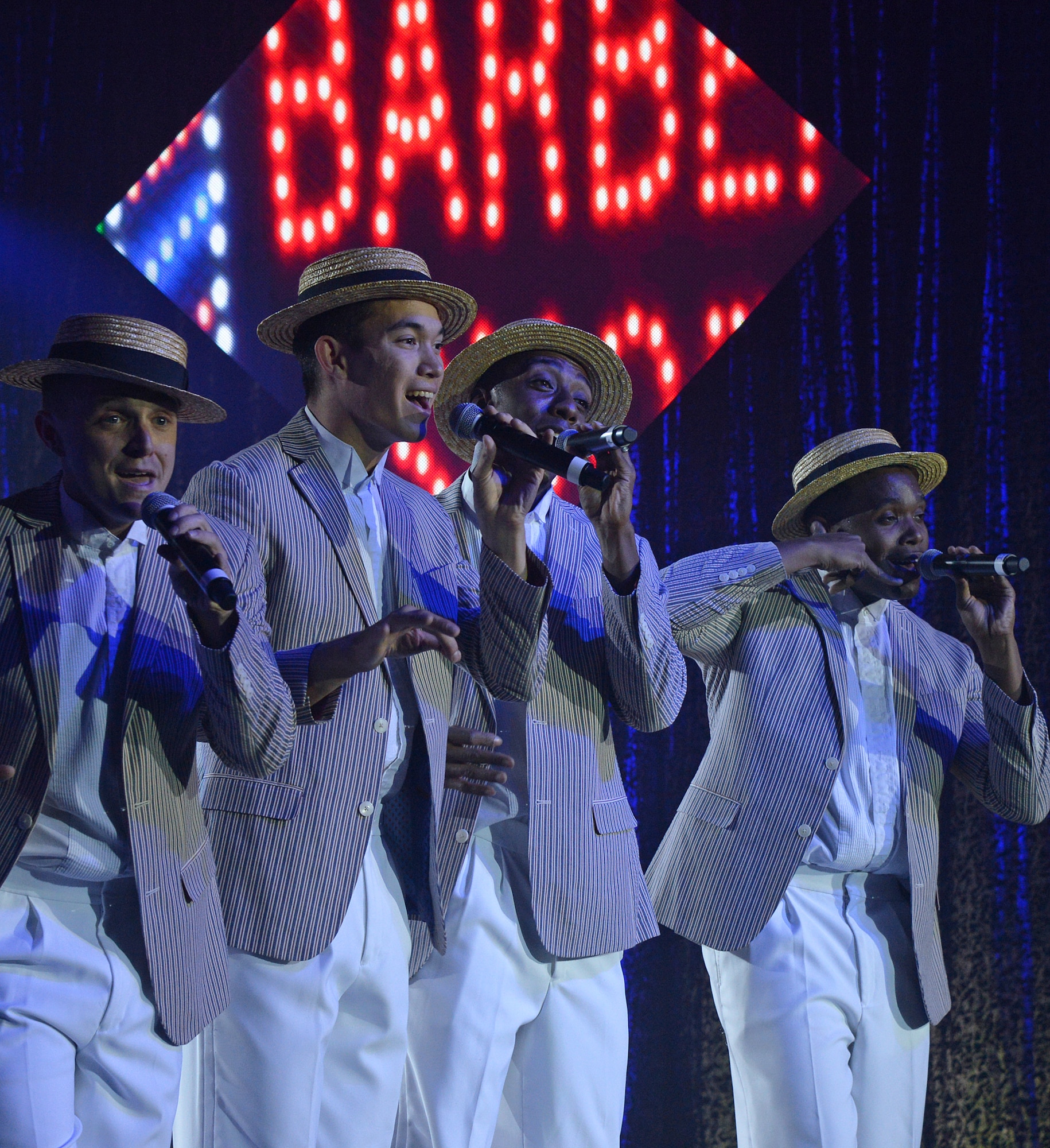 Tops in Blue members perform a barber-shop-quartet number during their performance Nov. 20 at Peery's Egyptian Theater in Ogden, Utah. Community members, along with Hill Air Force Base Airmen and their families, attended the show performed by the Air Force’s premier entertainment troupe. (U.S. Air Force photo/Alex R. Lloyd)