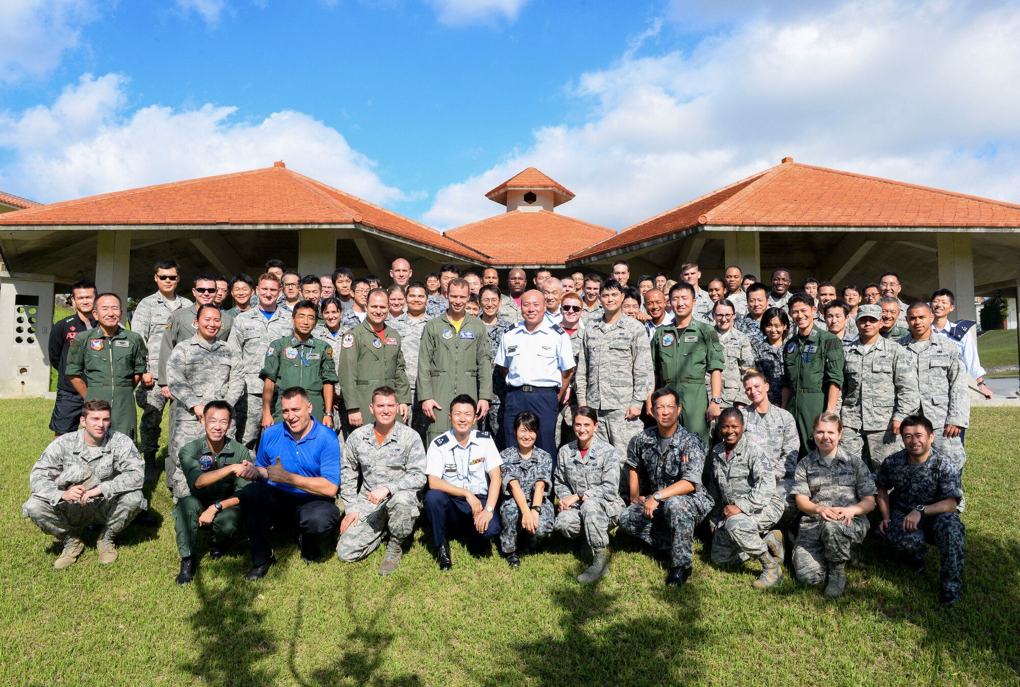 Approximately 40 U.S. Airmen from Kadena Air Base, Japan, participated in a wing exchange tour Nov. 20, 2015, to build bilateral relations with their Japan Air Self Defense Force counterparts at Naha Air Base, Japan. JASDF members from Naha AB were provided a similar wing exchange tour in July at Kadena as part of an effort to strengthen the alliance and familiarity between Air Forces. (U.S. Air Force photo by Senior Airman John Linzmeier)  