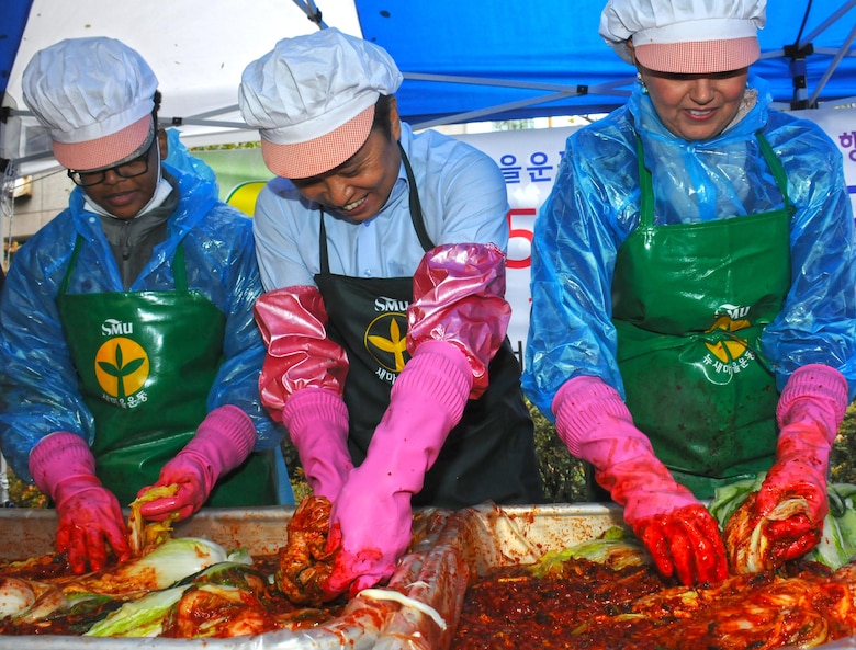 Volunteers from the U.S. Army Corps of Engineers' Far East District volunteered to help make kimchi on one brisk November day.