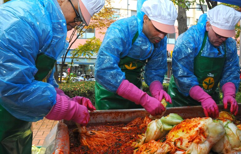 Volunteers from the U.S. Army Corps of Engineers' Far East District volunteered to help make kimchi on one brisk November day.