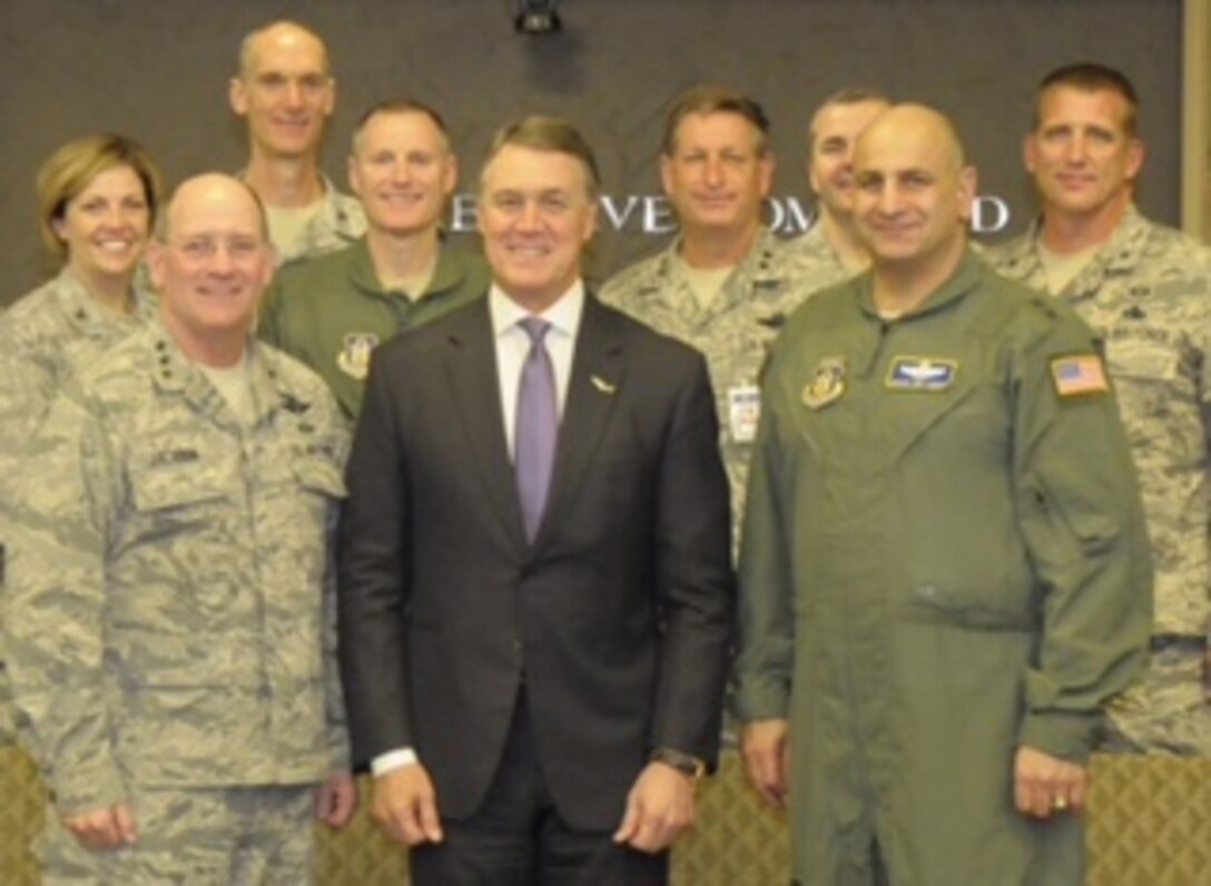 U.S. Senator David Perdue, (R) Georgia, poses for a photo with Headquarters Air Force Reserve Command leadership and staff at Robins Air Force Base, Georgia, Nov. 24, 2015. (U.S. Air Force photo by Robert Helton/RELEASED)  