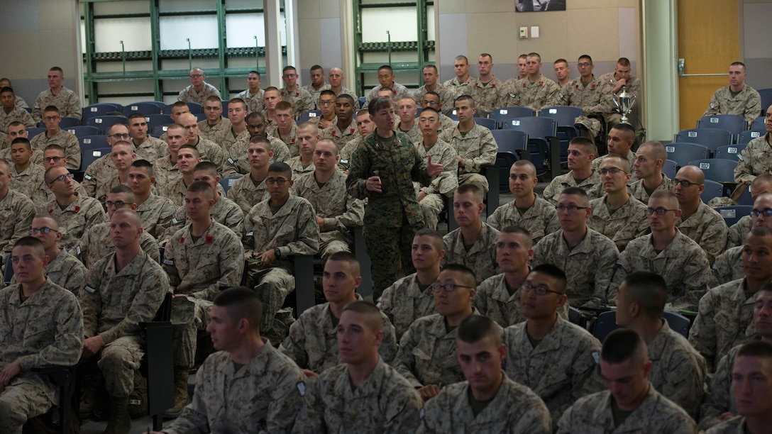 Col. Julie L. Nethercot, commanding officer of Officer Candidate School, teaches candidates about Marine officer history at Marine Corps Base Quantico, Virginia, Nov. 20, 2015. The candidates of Class 0CC-220 graduated and were commissioned as second lieutenants during the 75th anniversary of OCS on Brown Field. (U.S. Marine Corps photo by Sgt. Eric Keenan)