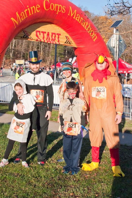 Capt. Vincent Olivera, left, and his five children attend the Turkey Trot 10K hosted by Marine Corps Marathon Nov. 21 aboard Marine Corps Base Quantico.