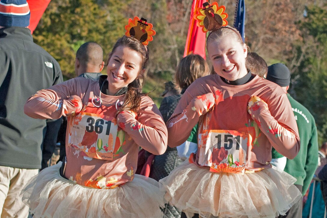 Ella Pizoli and Kiersten Esser, natives of Stafford, Va., attend the Turkey Trot 10K hosted by Marine Corps Marathon Nov. 21 aboard Marine Corps Base Quantico.