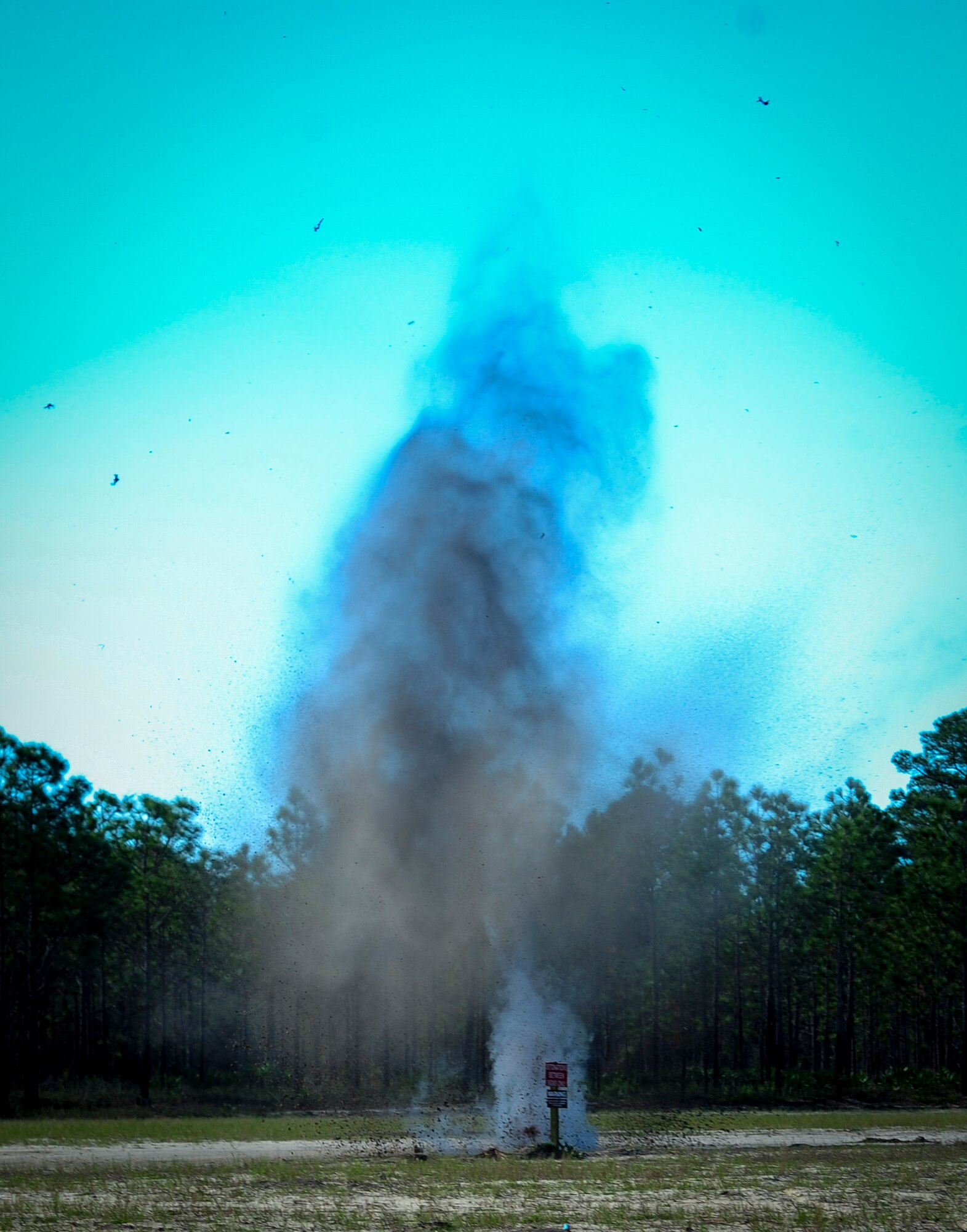 An improvised explosive device detonates during a training exercise at Hurlburt Field, Fla., Nov. 19, 2015. Wood boxes, plastic containers and backpacks are some items that can be used to make an IED, as well as multiple types of batteries. (U.S. Air Force photo by Senior Airman Meagan Schutter)