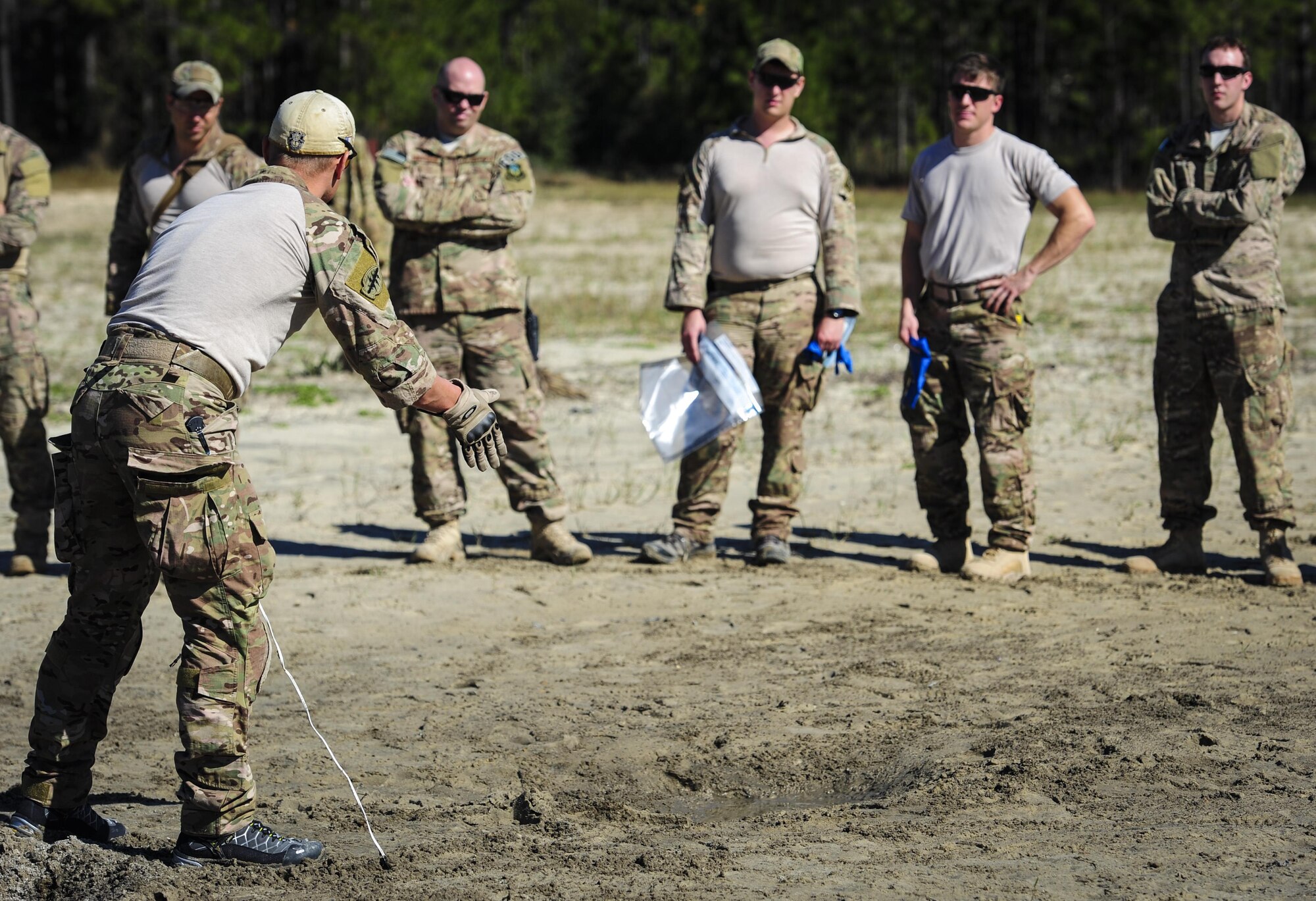 Master Sgt. Ronnie Brickey, an explosive ordnance disposal operations section chief with the 1st Special Operations Civil Engineer Squadron, speaks to Airmen during post-blast analysis training at Hurlburt Field, Fla., Nov. 19, 2015. A Post-blast analysis takes place when an improvised explosive device detonates and EOD Airmen arrive on scene to determine what happened. (U.S. Air Force photo by Senior Airman Meagan Schutter)