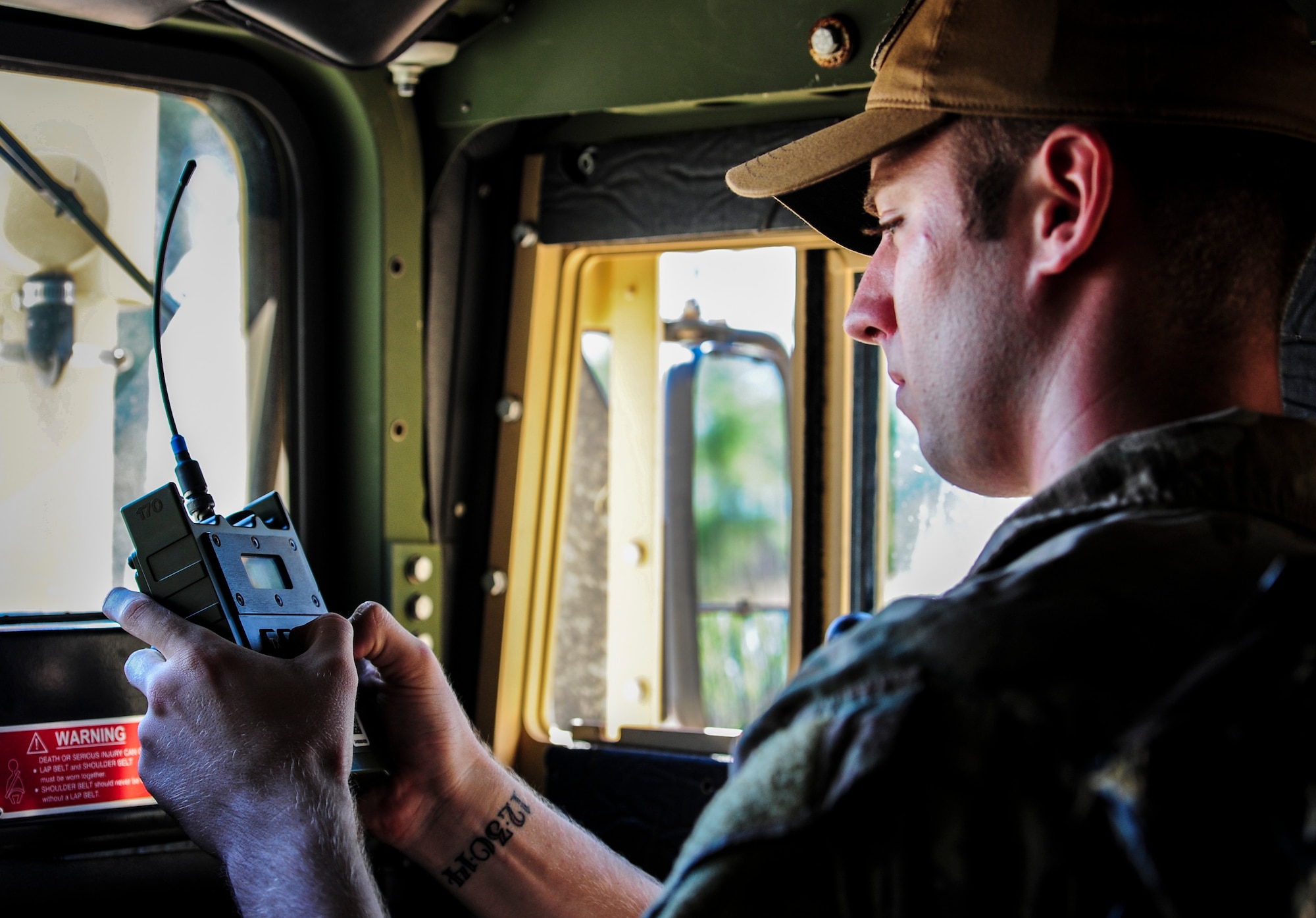 Senior Airman Teddy Compston, an explosive ordnance disposal journeyman, with the 1st Special Operations Civil Engineer Squadron detonates an improvised explosive device during a training exercise at Hurlburt Field, Fla., Nov. 19, 2015. Wood boxes, plastic containers and backpacks are some items that can be used to make an improvised explosive device, as well as multiple types of batteries. (U.S. Air Force photo by Senior Airman Meagan Schutter)