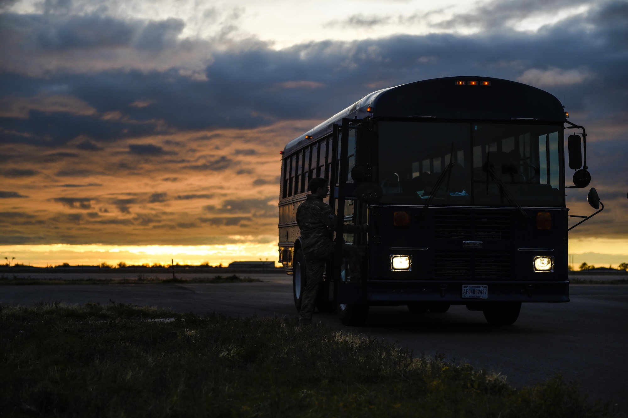 An Air Commando boards a bus returning to base lodging after training missions during exercise Ultimate Archer at Hill Air Force Base, Utah, Nov. 4, 2015. Ultimate Archer was a task force exercise that put Air Commandos in an unfamiliar environment to practice deployed operations. The six-day exercise gave Hurlburt Airmen a chance to work with units outside of the 1st Special Operations Wing including the 388th Fighter Wing and the 19th Special Operations Group. (U.S. Air Force photo by Airman Kai White)