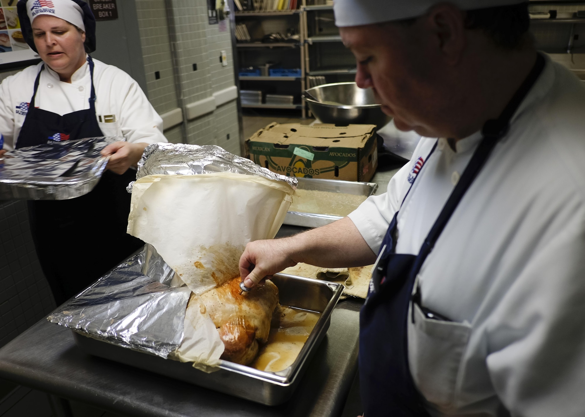 John Collins, a contract cook with the 1st Special Operations Force Support Squadron, prepares a turkey for the Reef dining facility’s Thanksgiving luncheon at Hurlburt Field, Fla., Nov. 25, 2015. Airmen with the 1st SOFSS have been preparing food for days leading up to the Thanksgiving lunch buffet scheduled for Nov. 26, 2015. (U.S. Air Force photo by Airman Kai White)