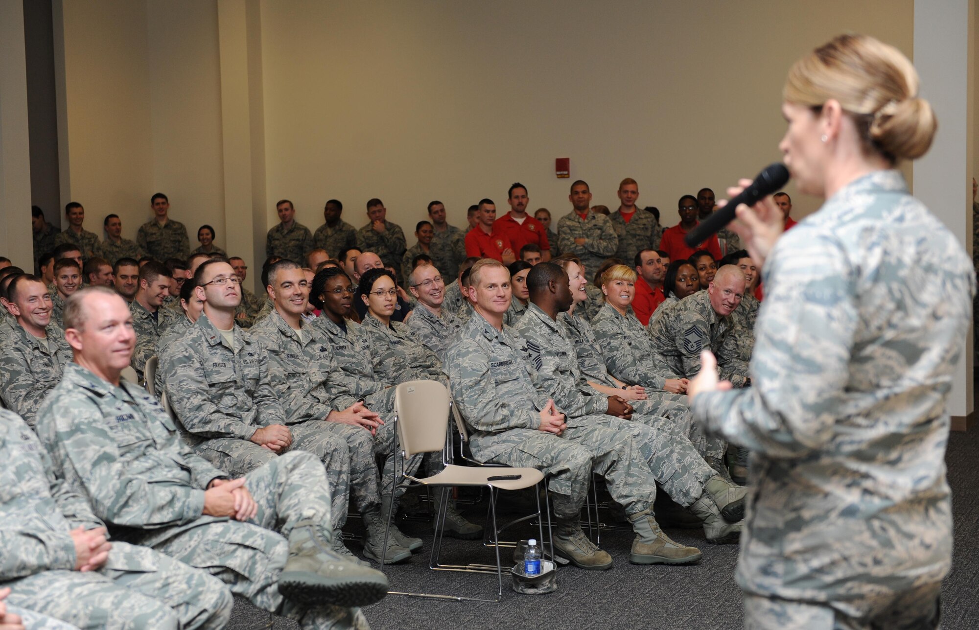 Col. Michele Edmondson, 81st Training Wing commander, speaks during the final commander’s call at the Roberts Consolidated Aircraft Maintenance Facility Nov. 20, 2015, Keesler Air Force Base, Miss. The event was the final one of several wing events held during Wingman Week to reinforce the wingman concept and focus on unit cohesion and wellness. (U.S. Air Force photo by Kemberly Groue)