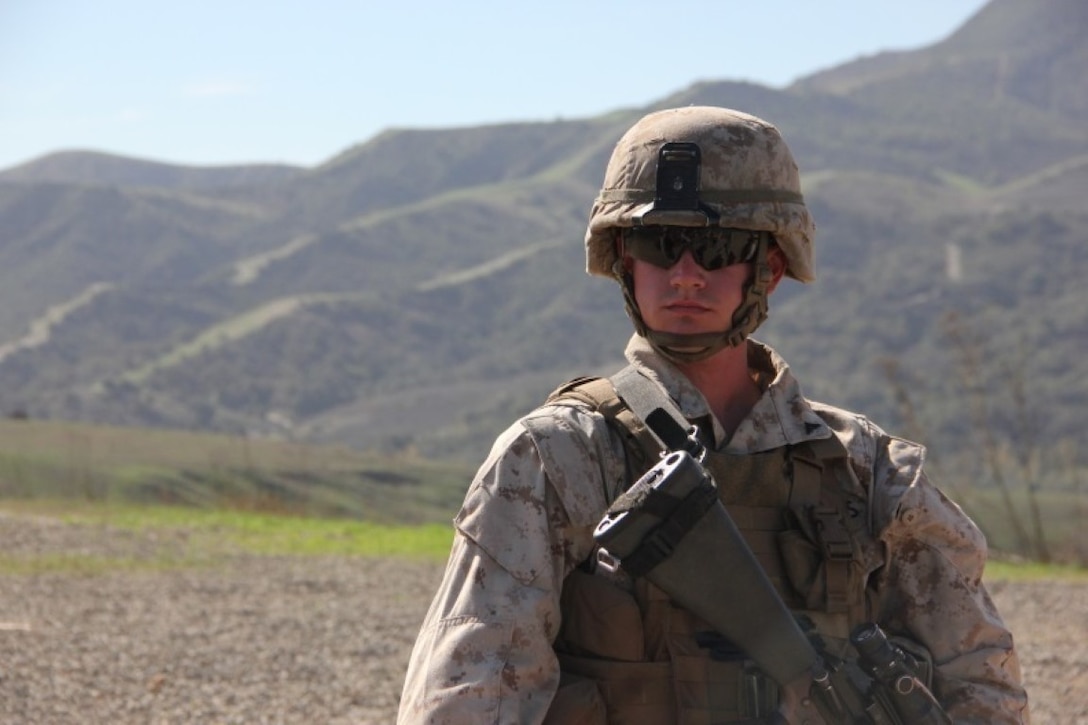 Lance Cpl. Taylor Drake, a combat engineer with 2nd Platoon, Bravo Company, 1st Combat Engineer Battalion, 1st Marine Division, prepares for breaching and room clearing drills aboard Marine Corps Base Camp Pendleton, Calif., Oct. 8, 2015. Drake, a Phoenix native, joined the Marine Corps to carry on the legacy of his family.