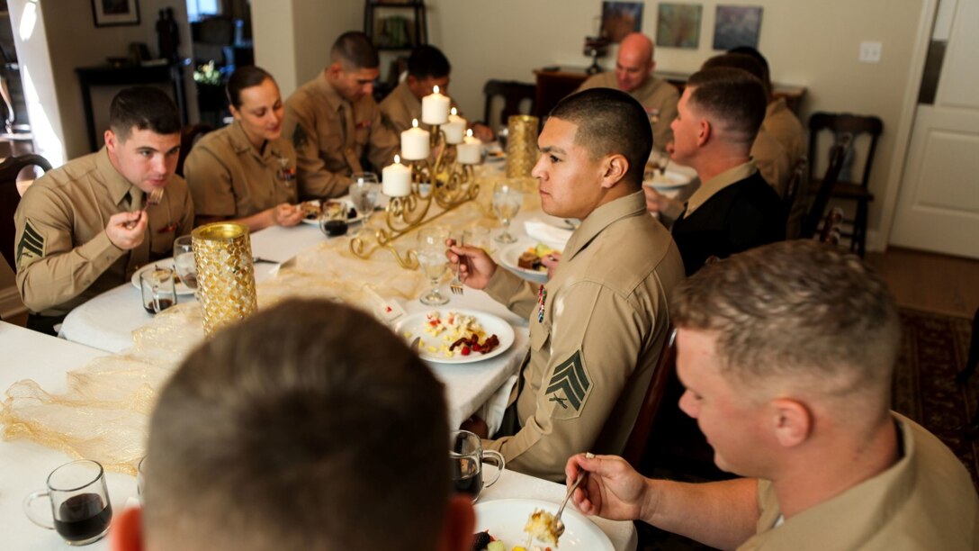 Marines and sailors with 1st Marine Logistics Group, I Marine Expeditionary Force, eat breakfast with Brig. Gen. David Ottignon, commanding general of 1st MLG, and other senior leaders at an awards breakfast aboard Marine Corps Base Camp Pendleton, Calif., Nov. 20, 2015. The awards breakfast was held to congratulate exemplary service members for their achievements while at 1st MLG.