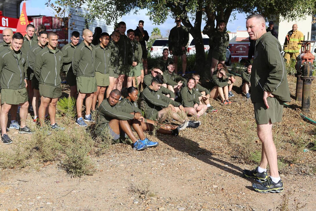 Col. William Swan, commanding officer of Headquarters Squadron, Marine Aircraft Group 11, prepares his Marines for a demonstration of the improper use of a turkey fryer aboard Marine Corps Air Station Miramar, Calif., Nov 21. The Miramar Fire Department held its annual safety demonstration to discuss holiday season safety issues and show the Marines preventative measures.