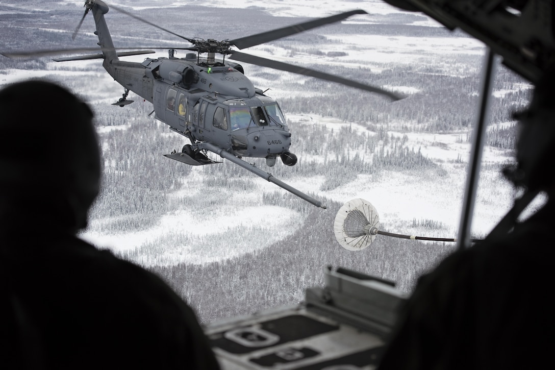 Air Force Col. Harlie Bodine, commander of the 611th Air and Space Operations Center, participates in an immersion flight with the 176th Wing, Alaska Air National Guard’s rescue squadrons on Joint Base Elmendorf-Richardson, Alaska, Nov. 24, 2015. U.S. Air National Guard photo by Staff Sgt. Edward Eagerton