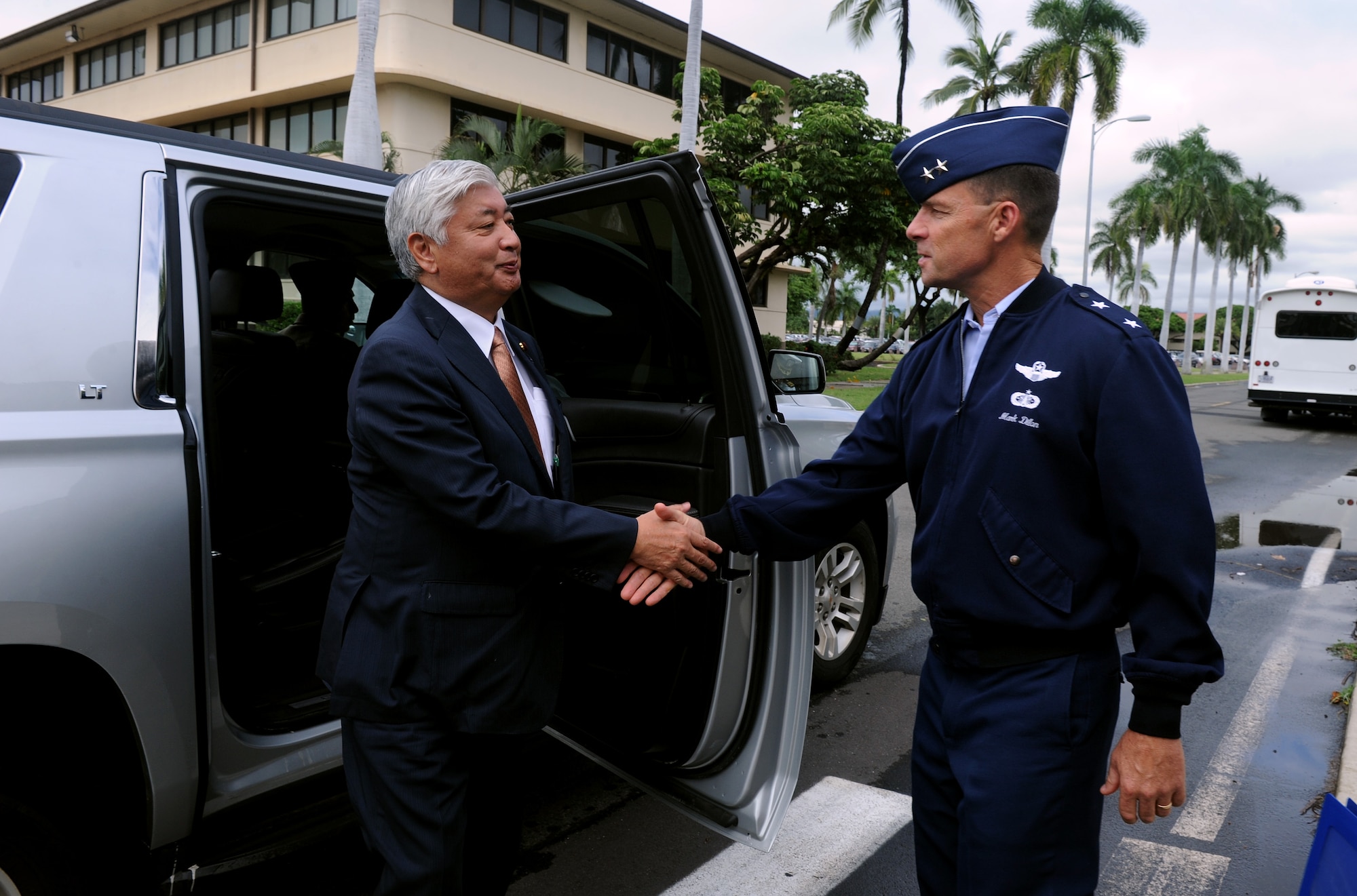 U.S. Air Force Maj. Gen. Mark Dillon, Pacific Air Forces vice commander, greets Japan Minister of Defense Gen Nakatani, during his visit to the 613th Air Operations Center Nov. 23, 2015, at Joint Base Pearl Harbor-Hickam, Hawaii. Nakatani and members of his defense forces were here to conduct bilateral talks with U.S. Pacific Command and PACAF about ongoing and future operations in the pacific. (U.S. Air Force photo by Staff Sgt. Alexander Martinez/Released)