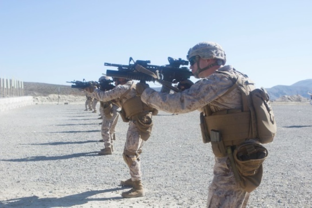 Students of the Urban Leaders Course perform close-quarters combat engagement aboard Marine Corps Base Camp Pendleton, Oct. 26. The close-quarters engagement is meant to put the Marines in the mindset that they will not always be able to engage their target in a stable position.