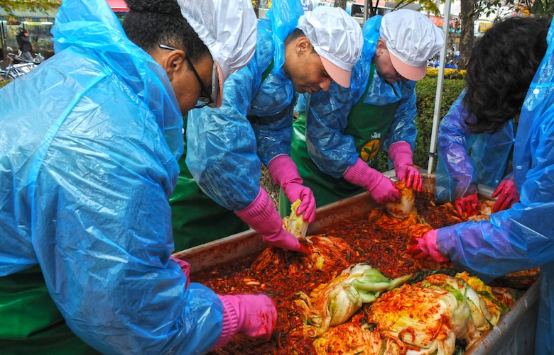 Volunteers from the U.S. Army Corps of Engineers' Far East District volunteered to help make kimchi on one brisk November day.