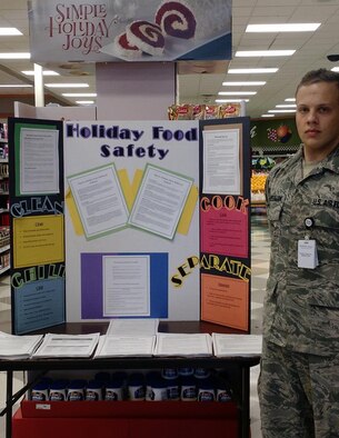 Senior Airman Gabriel Marshman of the 366th Aerospace Medicine Squadron public health flight educates commissary patrons on holiday food safety. (Courtesy photo by 366th Aerospace Medicine Squadron)