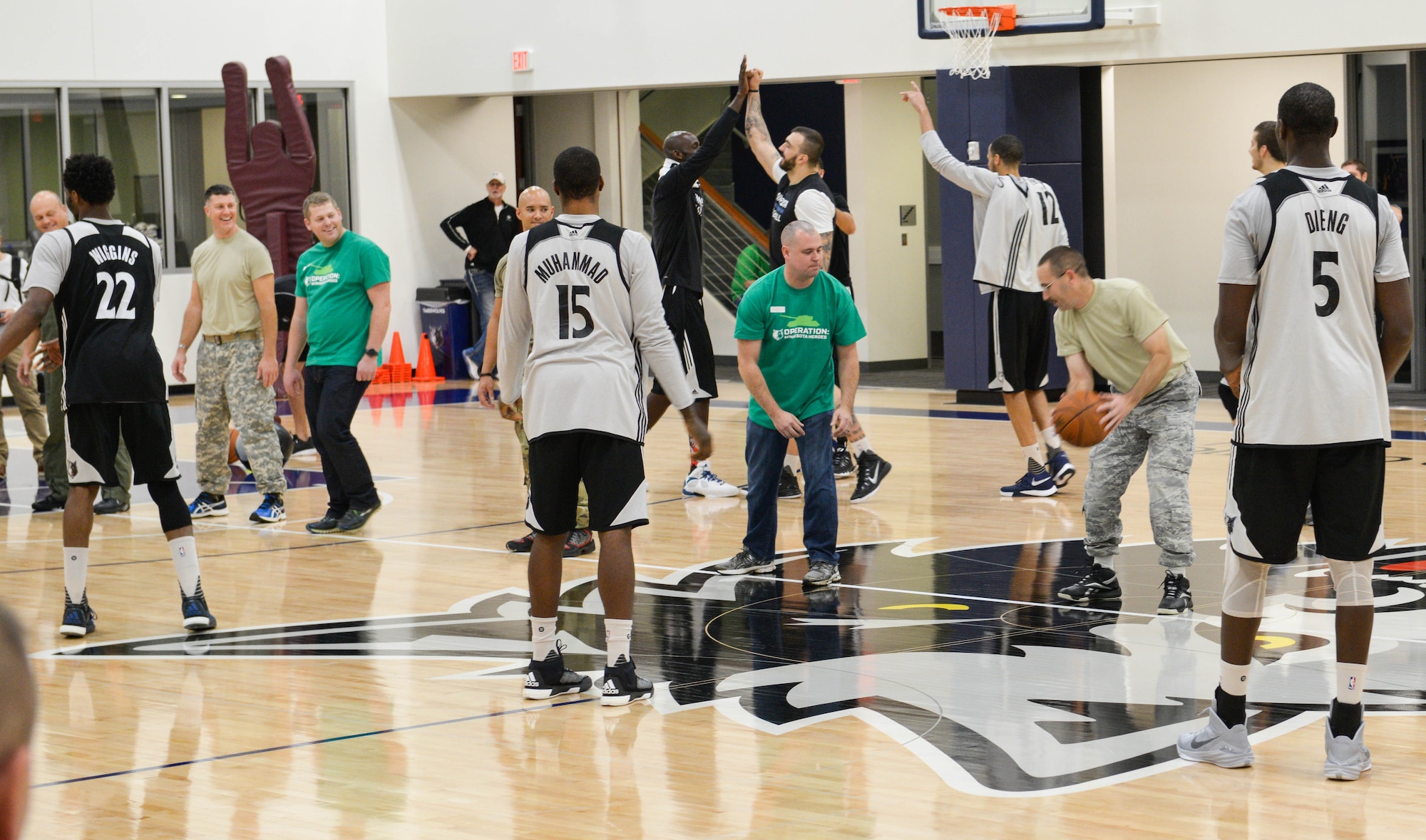 Master Sgt. Clint Hamann, 934th Maintenance Squadron, passes the ball during a speed contest with the Minnesota Timberwolves. (Air Force Photo/Capt. William-Joseph Mojica)