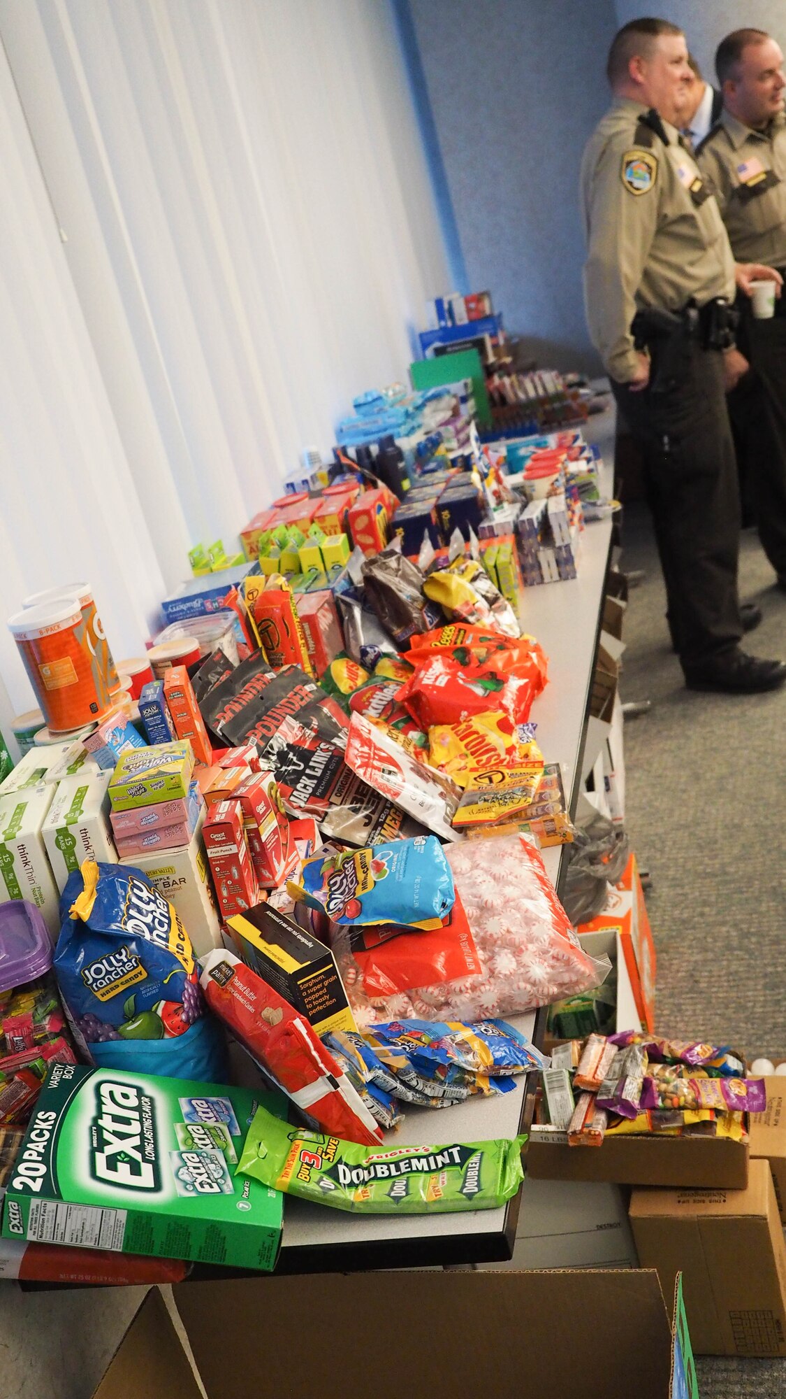 Holiday food items ready for packing and shipping to deployed military members. (Air Force Photo/Paul Zadach)