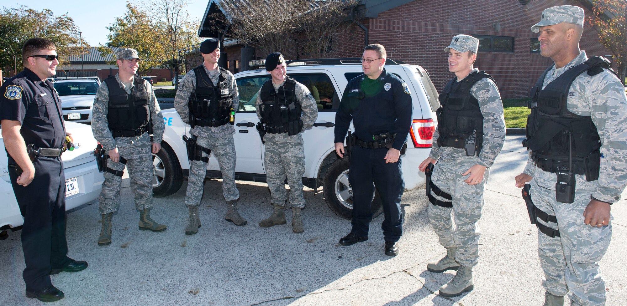 The 628th Medical Group meet with the 628th Security Forces Squadron outside the SFS building to discuss assignments at Joint Base Charleston – AB, S.C., on Nov. 20, 2015. The 628th MDG immersed themselves with the 628th SFS to develop workout and treatment programs to improve the physical being of members of the 628th SFS. (U.S. Air Force photo/Airman 1st Class Thomas T. Charlton) 