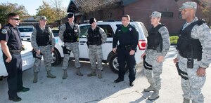 The 628th Medical Group meet with the 628th Security Forces Squadron outside the SFS building to discuss assignments at Joint Base Charleston – AB, S.C., on Nov. 20, 2015. The 628th MDG immersed themselves with the 628th SFS to develop workout and treatment programs to improve the physical being of members of the 628th SFS. (U.S. Air Force photo/Airman 1st Class Thomas T. Charlton) 