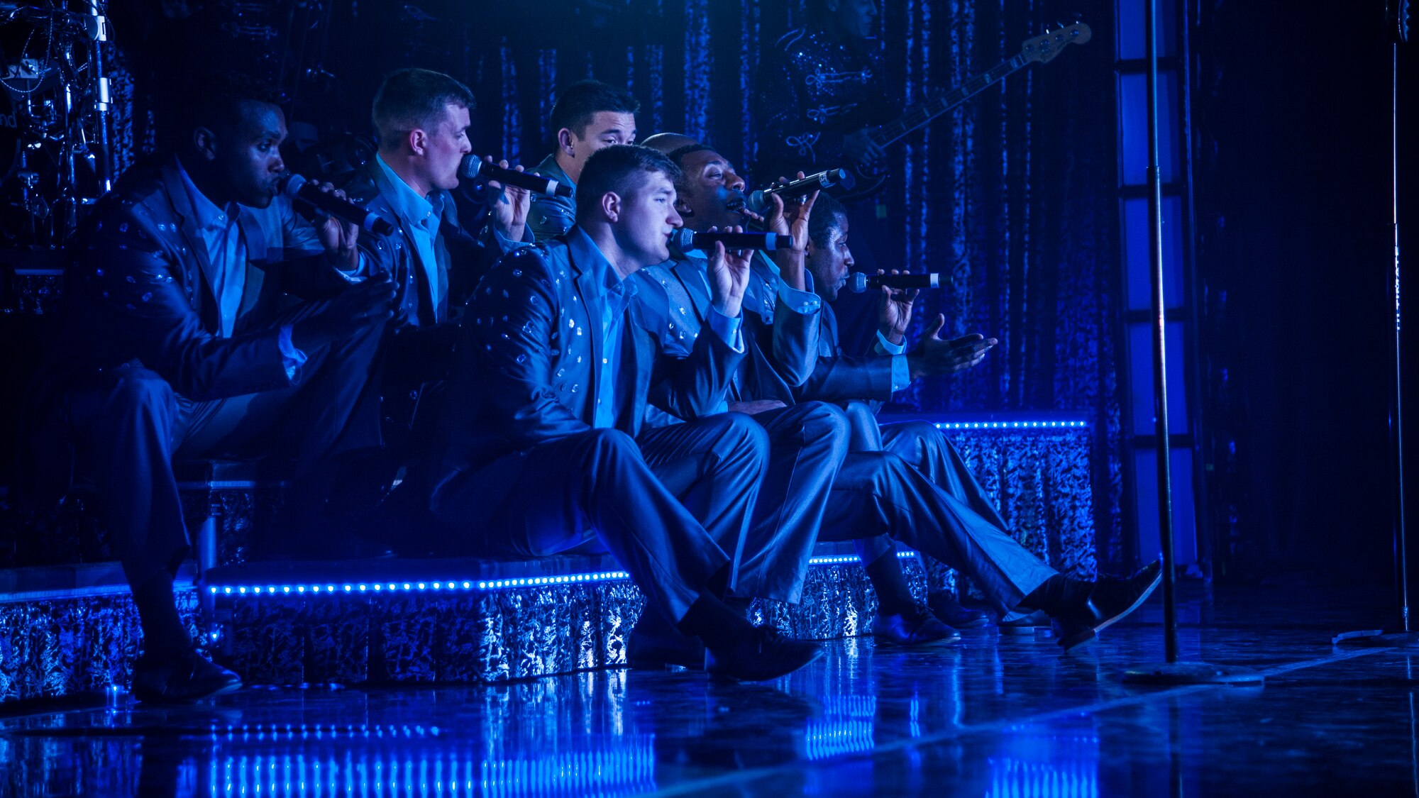 Tops in Blue performers sing during a performance Nov. 23, 2015, Northern Quest Casino in Airway Heights, Wash. The group range from the young Airmen and officers to the seasoned senior NCOs who come from a wide variety of Air Force career fields, including maintenance to medical, communications to intelligence and everything in between. (U.S. Air Force photo/ Airman 1st Class Sean Campbell)