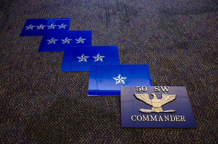 According to Air Force Instruction 34-1201, military members on foot must salute when a properly marked staff car passes. Parked staff cars with no driver do not require salute. If no placard is present on the government owned vehicle, no salute is required. However, it is courtesy to salute if the military member on foot recognizes the driver. Salutes are never required or requested if the driver is in a personally owned vehicle, regardless if the military member on foot recognizes the driver. (U.S. Air Force photo/Tech. Sgt. Julius Delos Reyes)