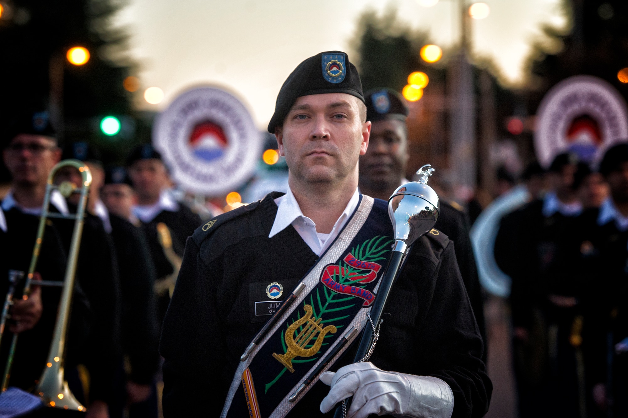 The U.S. Army Japan Band from Camp Zama, Japan, marches down the parade route during the Yokota Holiday Spectacular Parade at Yokota Air Base, Japan, Nov. 24, 2015. The parade was followed by a Christmas tree lighting ceremony at the Yokota Chapel. (U.S. Air Force phot by Airman 1st Class Delano Scott/Released)