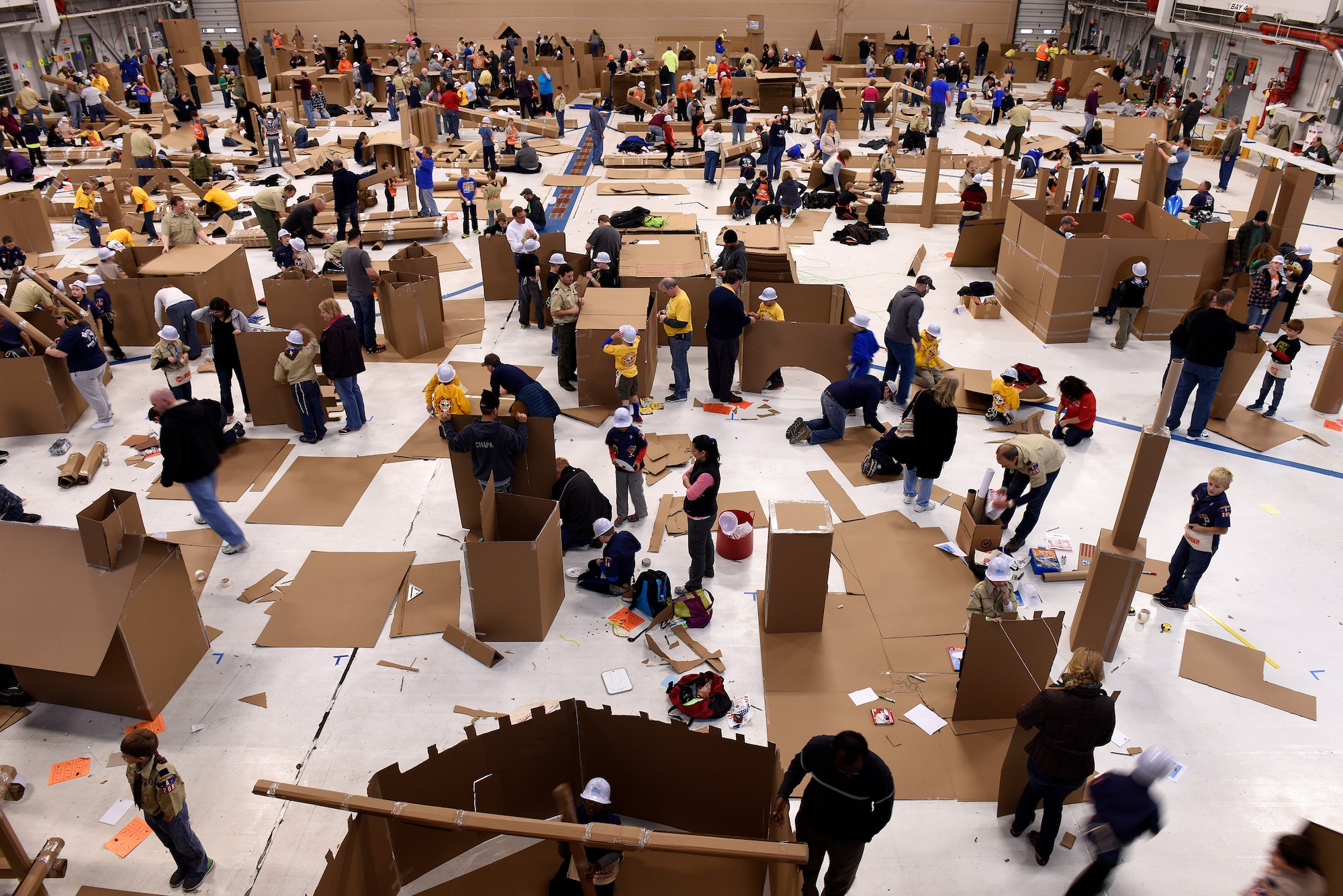 More than 450 scouts, parents and volunteers build cities and bridges entirely out of cardboard during Construction City at the 180th Fighter Wing, Sat. Nov. 21, 2015. The one-day event to build cities and bridges entirely out of cardboard helped scouts learn valuable leadership skills. (U.S. Air National Guard photo by Staff Sgt. Shane Hughes/Released)