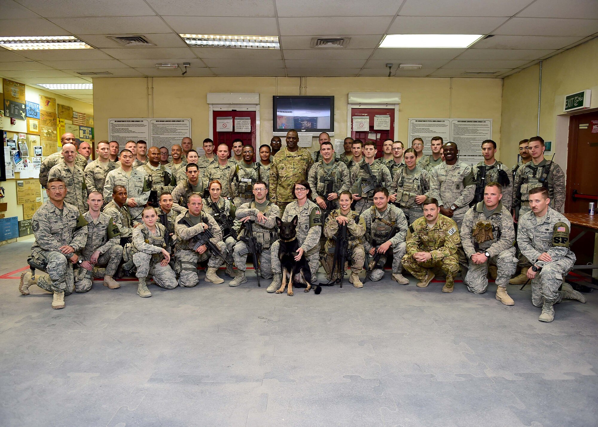 U.S. Army Gen. Lloyd J. Austin III, commander, U.S. Central Command poses for a photo with the 386th Expeditionary Security Forces Squadron at an undisclosed location in Southwest Asia, Nov. 24, 2015. Austin met with Airmen from various units and took the time to thank them for their contribution to the mission and support for the fight against ISIL. (U.S. Air Force photo by Staff Sgt. Jerilyn Quintanilla)