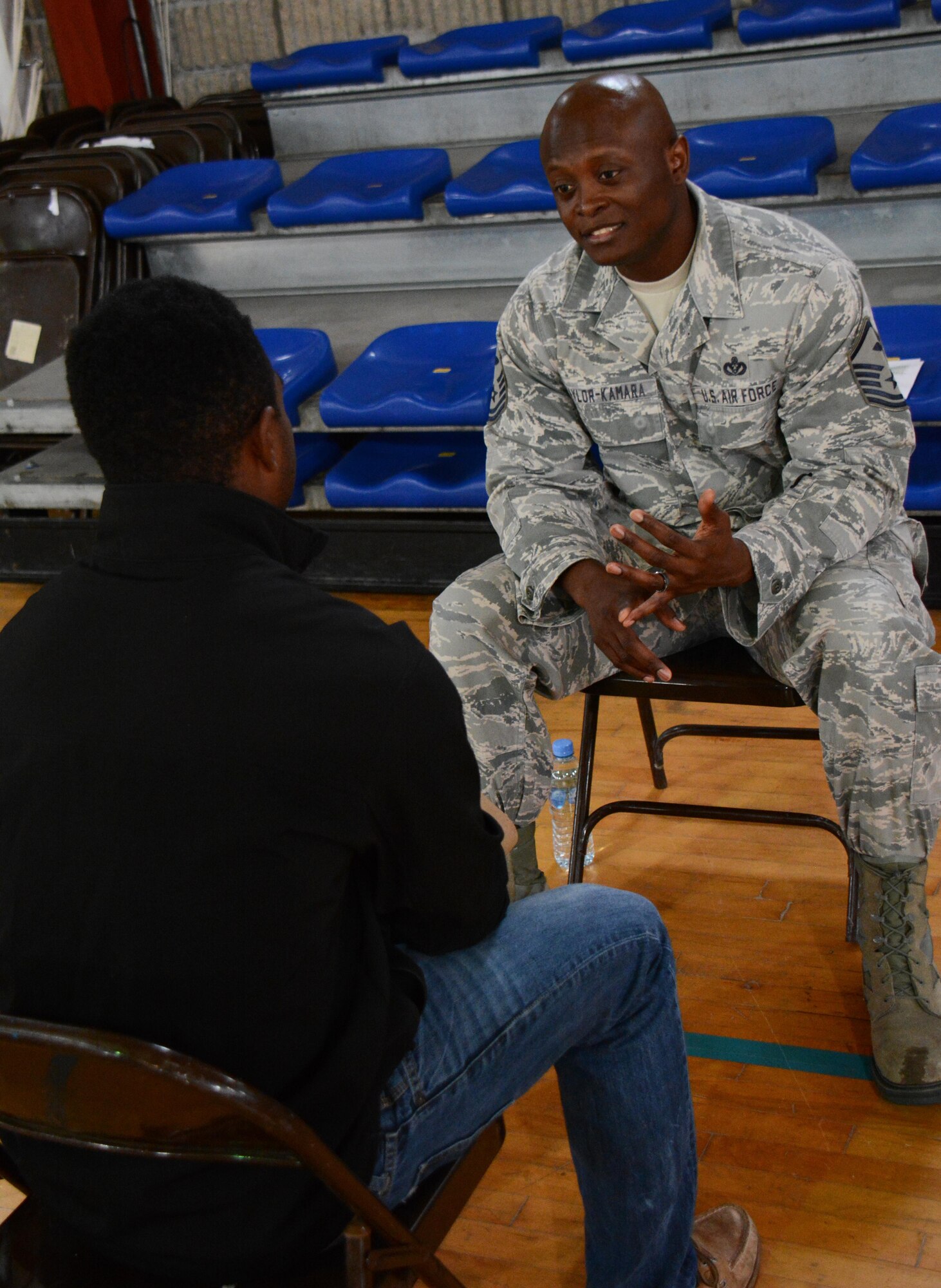 Master Sgt. Ismail Taylor-Kamara, 340th Expeditionary Air Refueling Squadron first sergeant, listens as an airman asks a question during a speed-mentoring session at Al Udeid Air Base, Qatar Nov. 25. The session featured 35 senior noncommissioned officers sharing career guidance with 26 airmen. Airmen who attended the session were able to get different perspectives from several SNCOs on the best way grow personally and professionally. (U.S. Air Force photo by Tech. Sgt. James Hodgman)