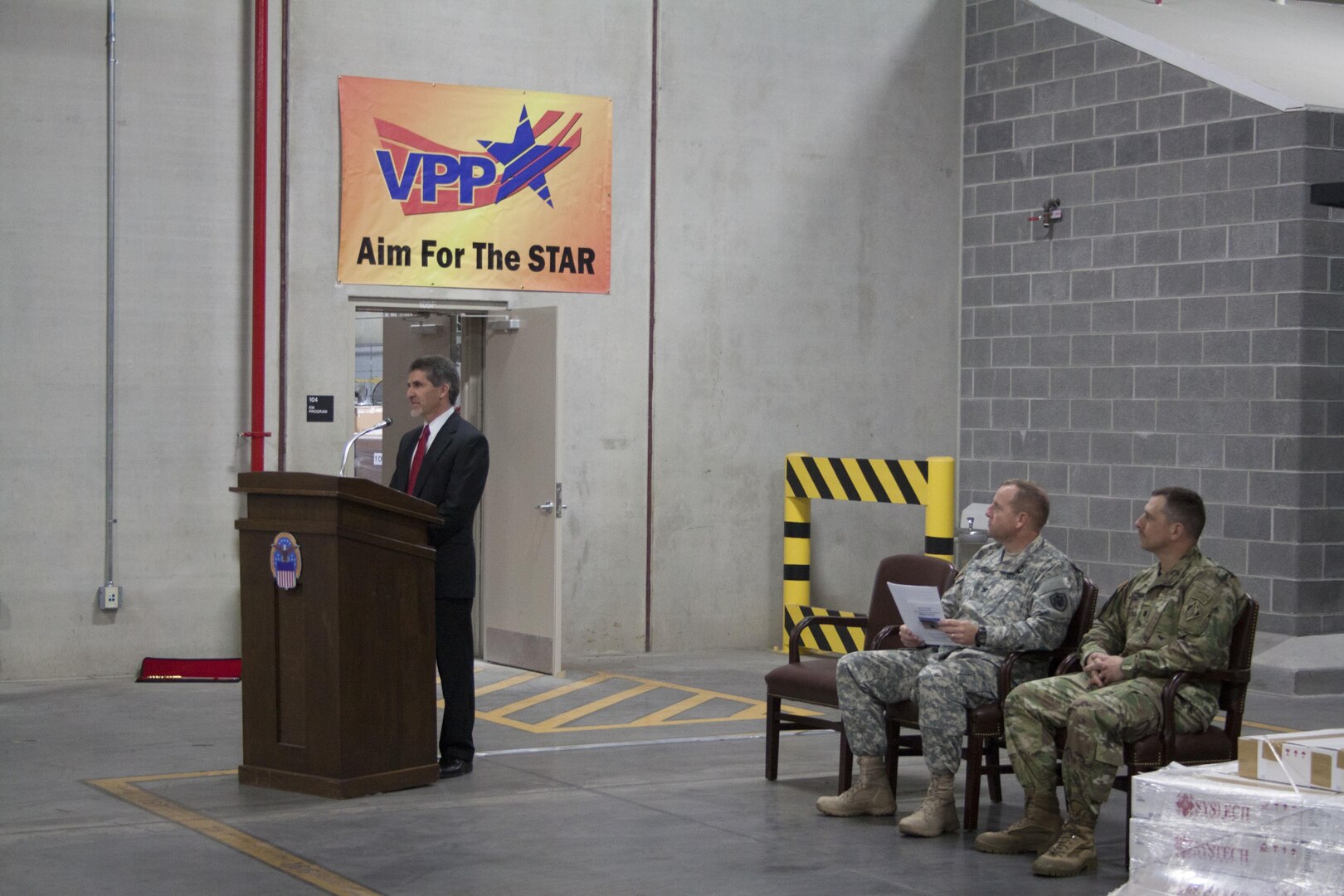 Robert Montefour, site director for Defense Logistics Agency Installation Support at Defense Distribution Susquehanna opens the ribbon ceremony for warehouse 780 on Nov. 16.