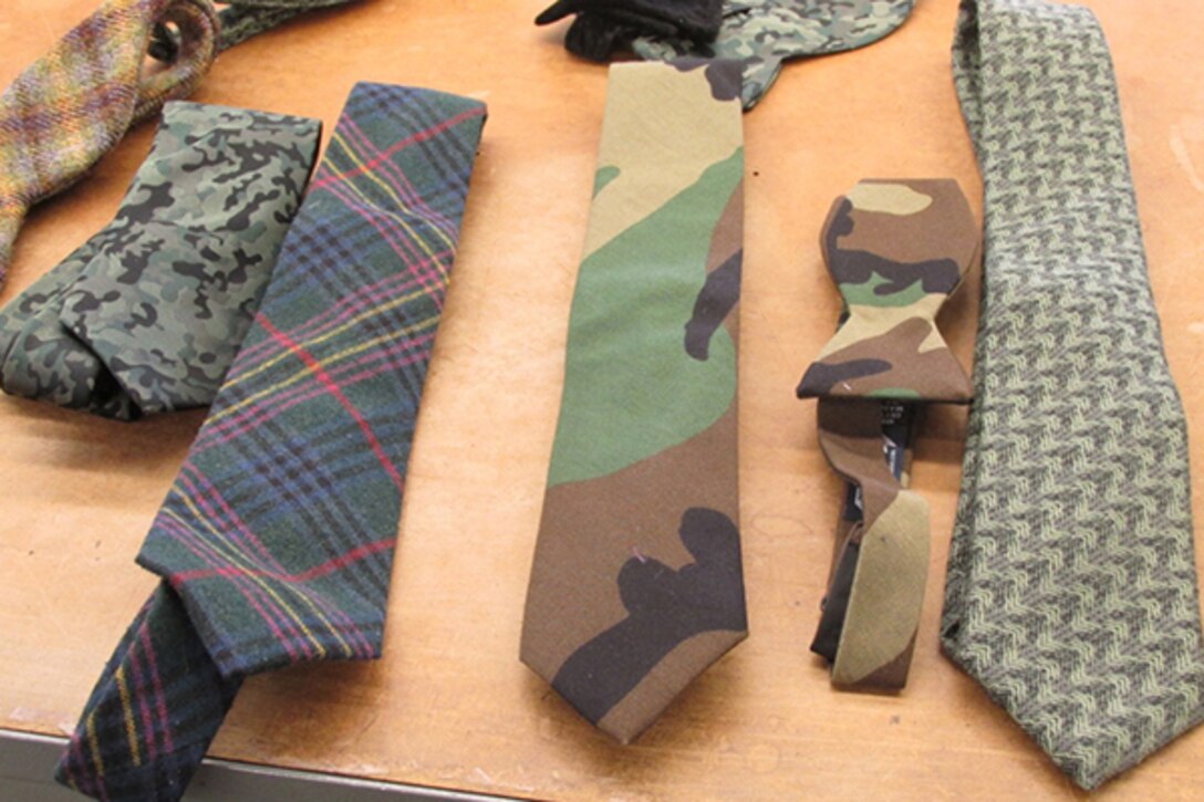 Ties and neckties made by Bull and Moose are made with a military theme or out of military surplus material. The company, owned by an Army veteran, was asked to design a tie for Defense Secretary Ash Carter.  DoD photo by Katie Lange 