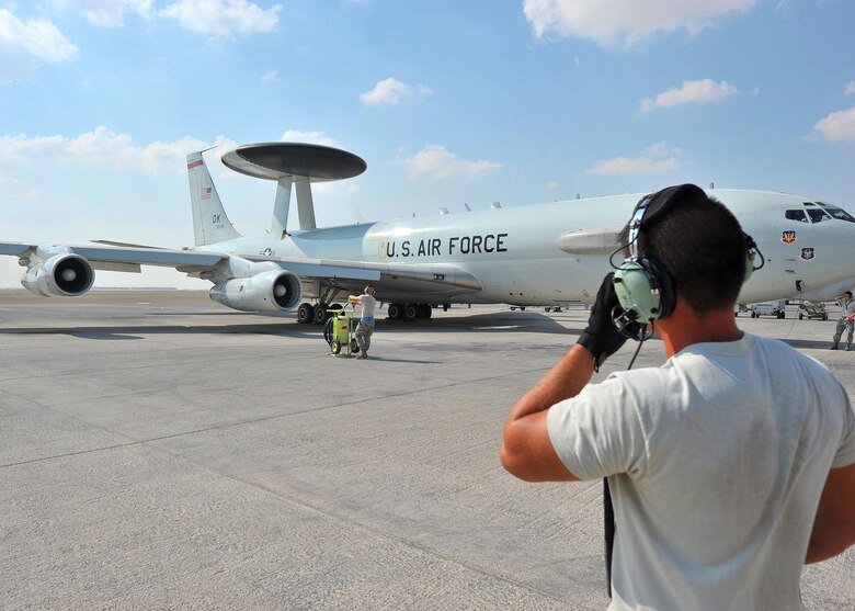 Maintainers from the 380th Air Expeditionary Squadron prep the E-3G Sentry airborne warning and control system aircraft for its first-ever combat sortie from an undisclosed location Southwest Asia, Nov. 20, 2015. The E-3G is the newest model of Sentry aircraft to be recently completed as part of the AWACS modernization program. (U.S. Air Force photo by Staff Sgt. Kentavist P. Brackin/Released)