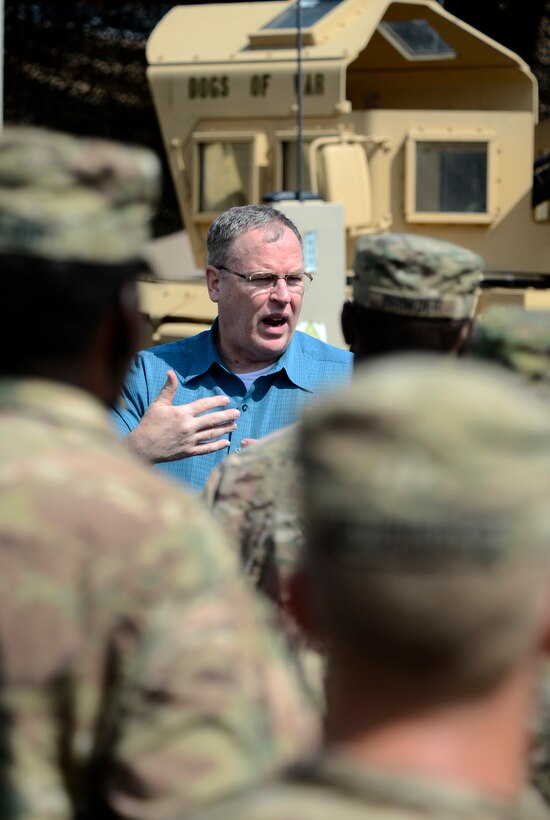 U.S. Deputy Defense Secretary Bob Work speaks with U.S. soldiers on Camp Lemonnier, Djibouti, Nov. 26, 2015. Work thanked the soldiers, assigned to the Florida Army National Guard's Company D, 2nd Battalion, 124th Infantry Regiment, for their service during the Thanksgiving holiday. U.S. Air Force photo by Senior Airman Peter Thompson