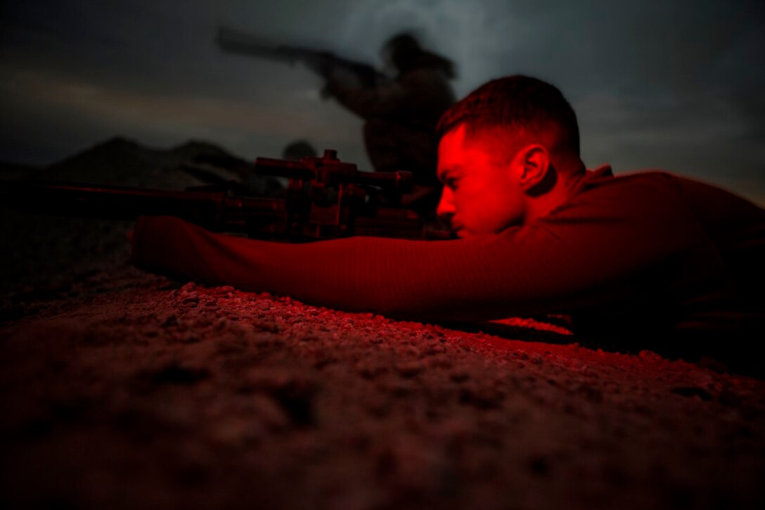 U.S. Marine Cpl. Taylor Giffard, a ground signals operator with Special Purpose Marine Air Ground Task Force-Crisis Response-Central Command, acts as an opposition force during a mission readiness exercise for 1st Battalion, 7th Marine Regiment, at an undisclosed location in Southwest Asia, Nov. 24, 2015. Giffard probed the Marine forward operating base and simulated enemy tactics to give the Marines a realistic look at possible scenarios during the exercise.  SPMAGTF-CR-CC is currently deployed with a crisis response mission spanning 20 nations in the U.S. Central Command area of responsibility. (U.S. Marine Corps Photo by Sgt. Owen Kimbrel / Released)