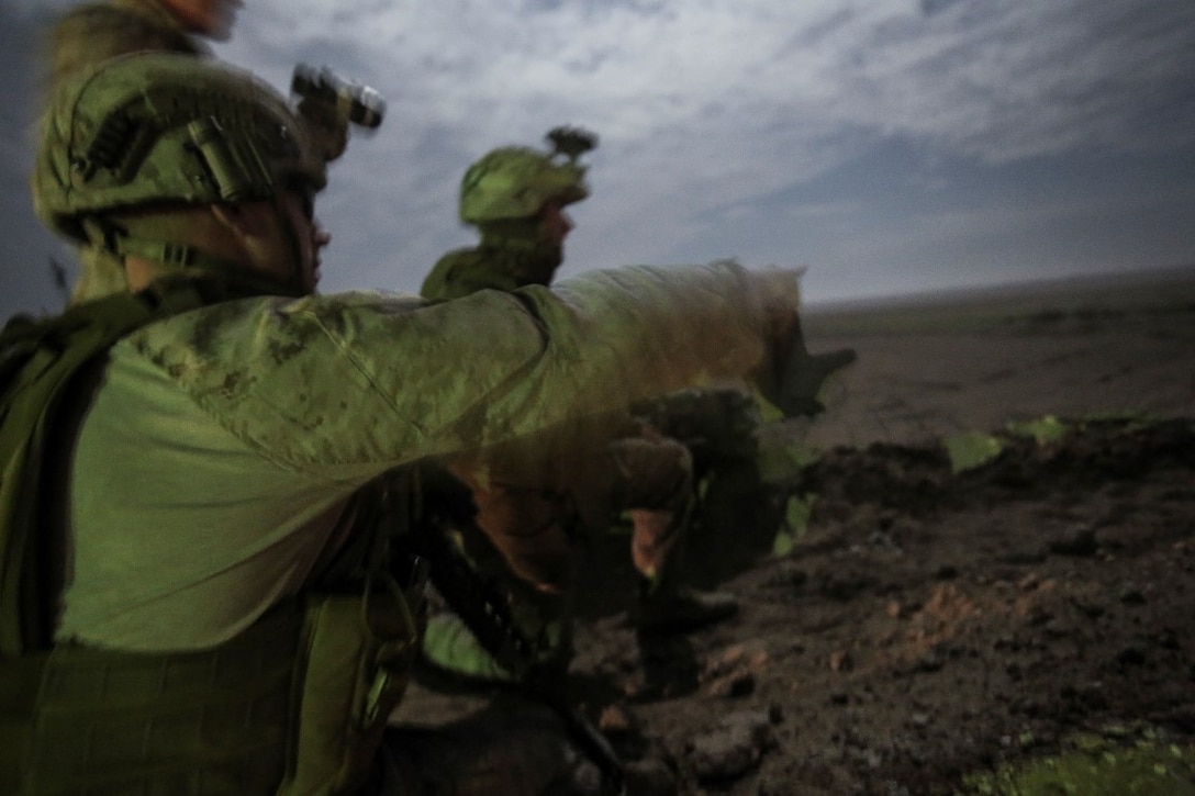 U.S. Marine explosive ordnance disposal technicians attached to Special Purpose Marine Air Ground Task Force-Crisis Response-Central Command, spot a simulated improvised explosive device in the vicinity of a forward operating base during a mission readiness exercise at an undisclosed location in Southwest Asia Nov. 24, 2015. The training exercise consisted of a scenario where a forward operating base in the area of responsibility required SPMAGTF-CR-CC reinforcement as part of its crisis response mission spanning 20 nations in the U.S. Central Command area of responsibility. (U.S. Marine Corps Photo by Sgt. Rick Hurtado / Released)