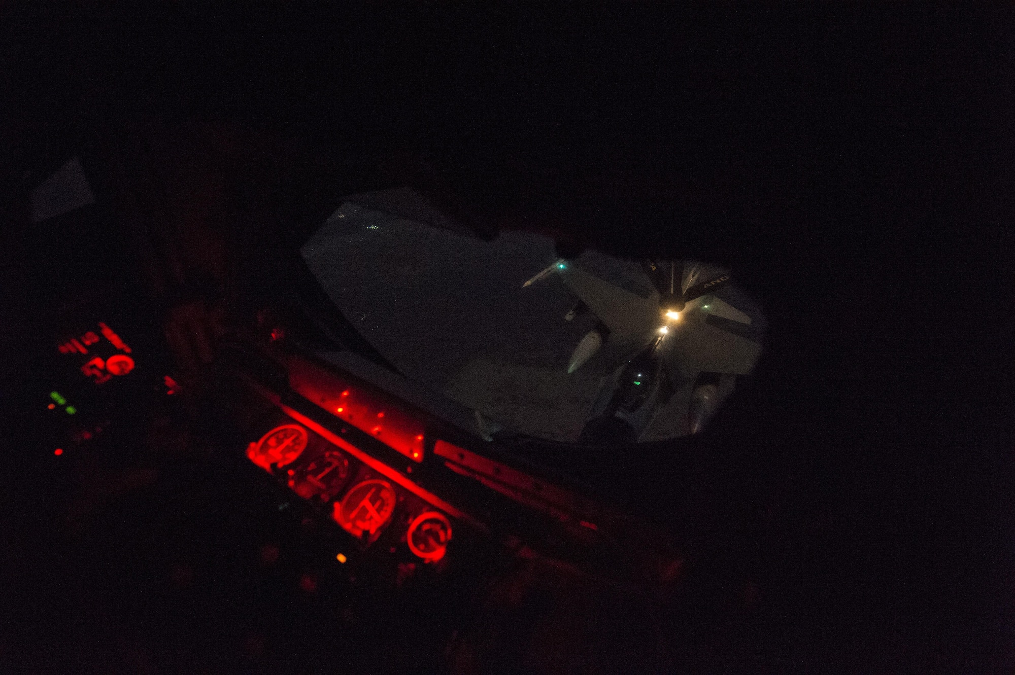 A U.S. Air Force F-16 Fighting Falcon assigned to the 421st Fighter Squadron receives fuel from a KC-135T, assigned to the 340th Expeditionary Air Refueling Squadron, over Southwest Asia, Nov. 23, 2015. Coalition forces fly daily missions in support of Operation Inherent Resolve. (U.S. Air Force photo by Staff Sgt. Corey Hook/Released)