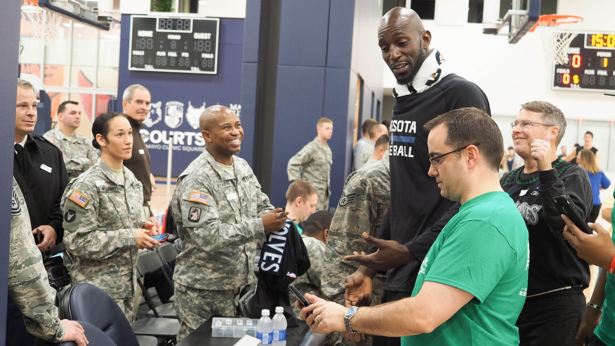 Timberwolves Power Forward/Center Kevin Garnett visits with military members during the open practice. (Air Force Photo/Paul Zadach)